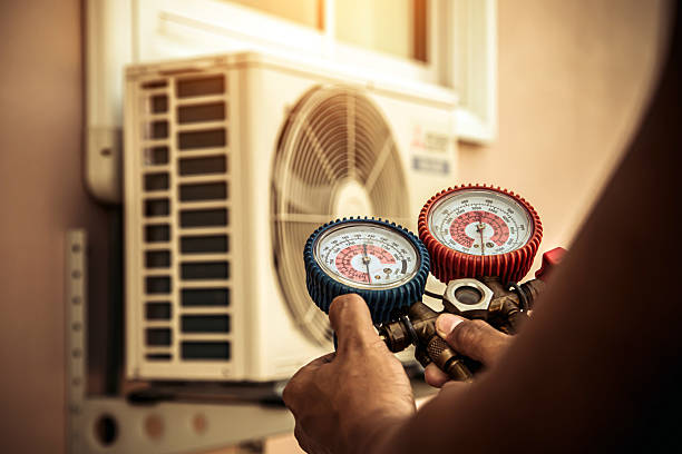 Professional Hvac Installation technician working in Weaver, AL